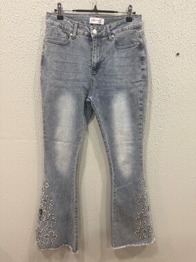 Bamboo Flared Jeans Womens 9
Blue Light Wash Embroidered
Crosses Distressed